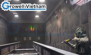 Máy phun bi công nghiệp làm sạch bề mặt kim loại