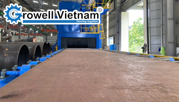 Vai trò của máy phun bi tấm thép trong sản xuất kết cấu thép