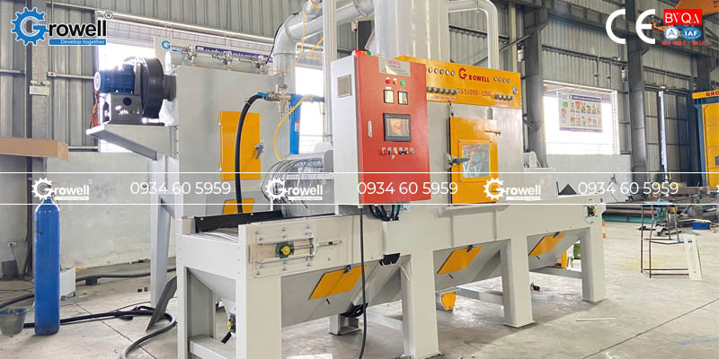 Máy phun cát băng tải lưới