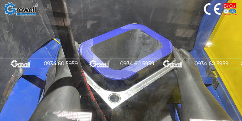 Máy phun cát bàn xoay