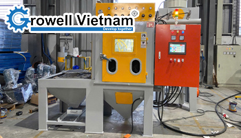 Máy phun cát bàn xoay và ứng dụng trong sản xuất công nghiệp